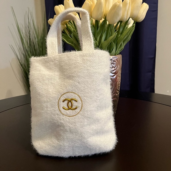 CHANEL Handbags - Chanel Beaute’ Soft Winter Metallic Logo Mini Tote